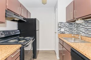 a modern kitchen with stainless steel appliances