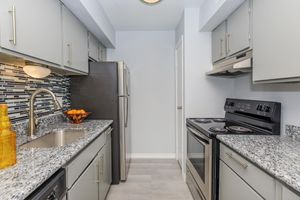 a modern kitchen with stainless steel appliances