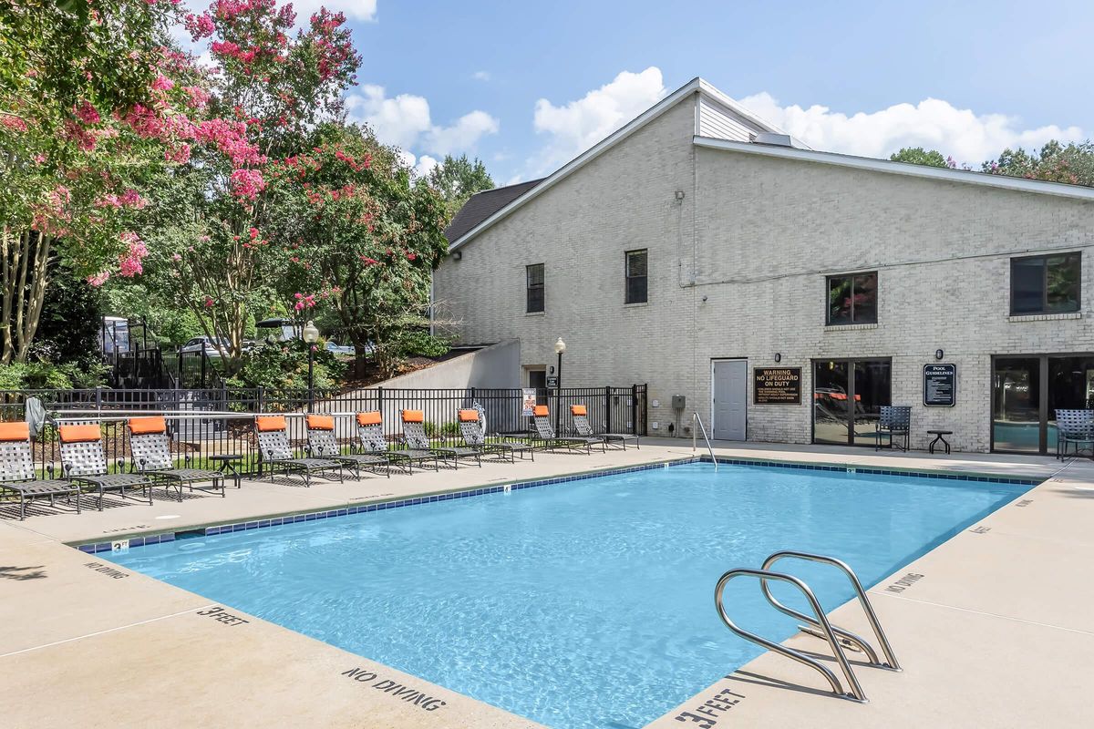 a pool next to a building