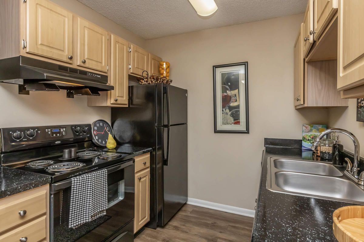 a modern kitchen with stainless steel appliances