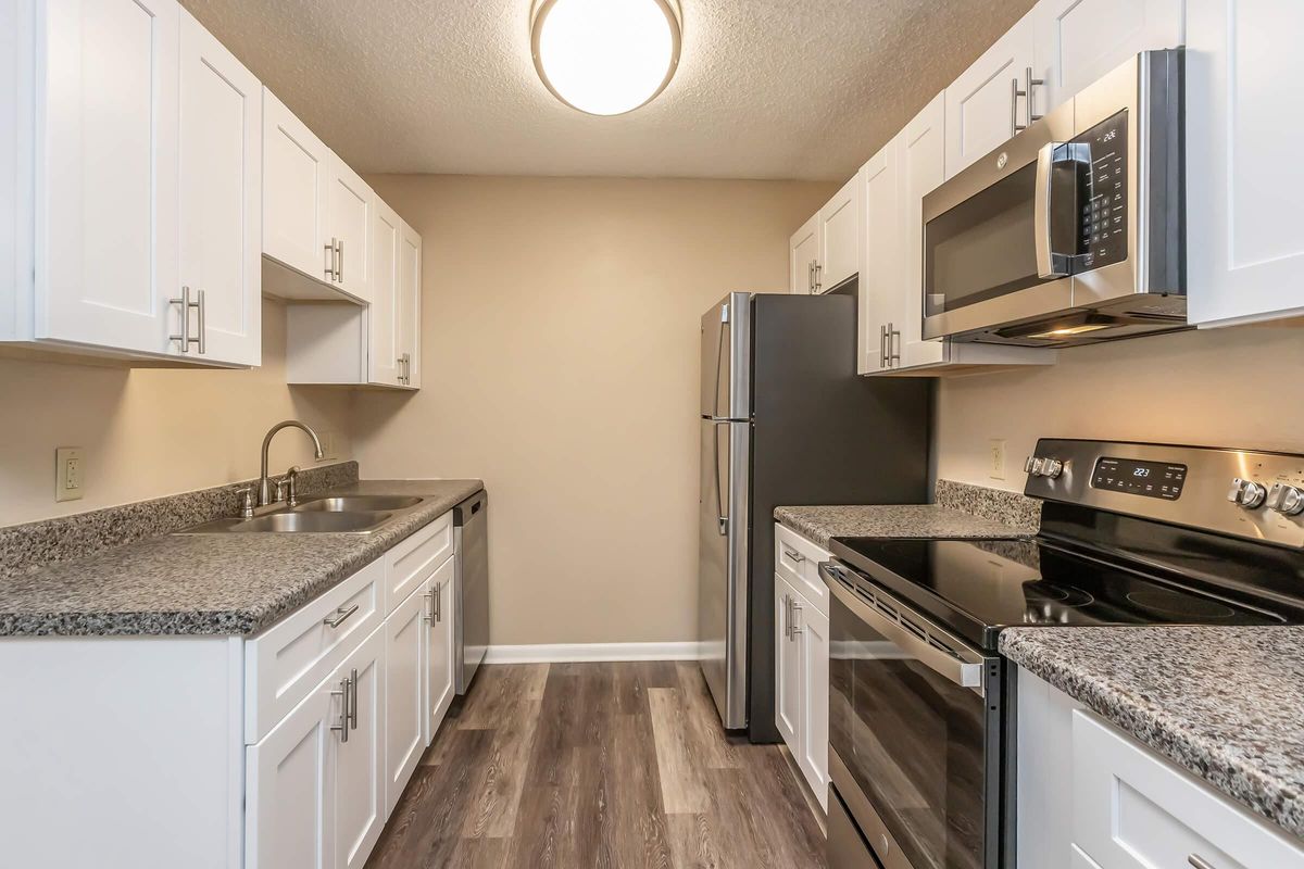 a modern kitchen with stainless steel appliances