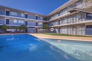 a building with a large pool of water