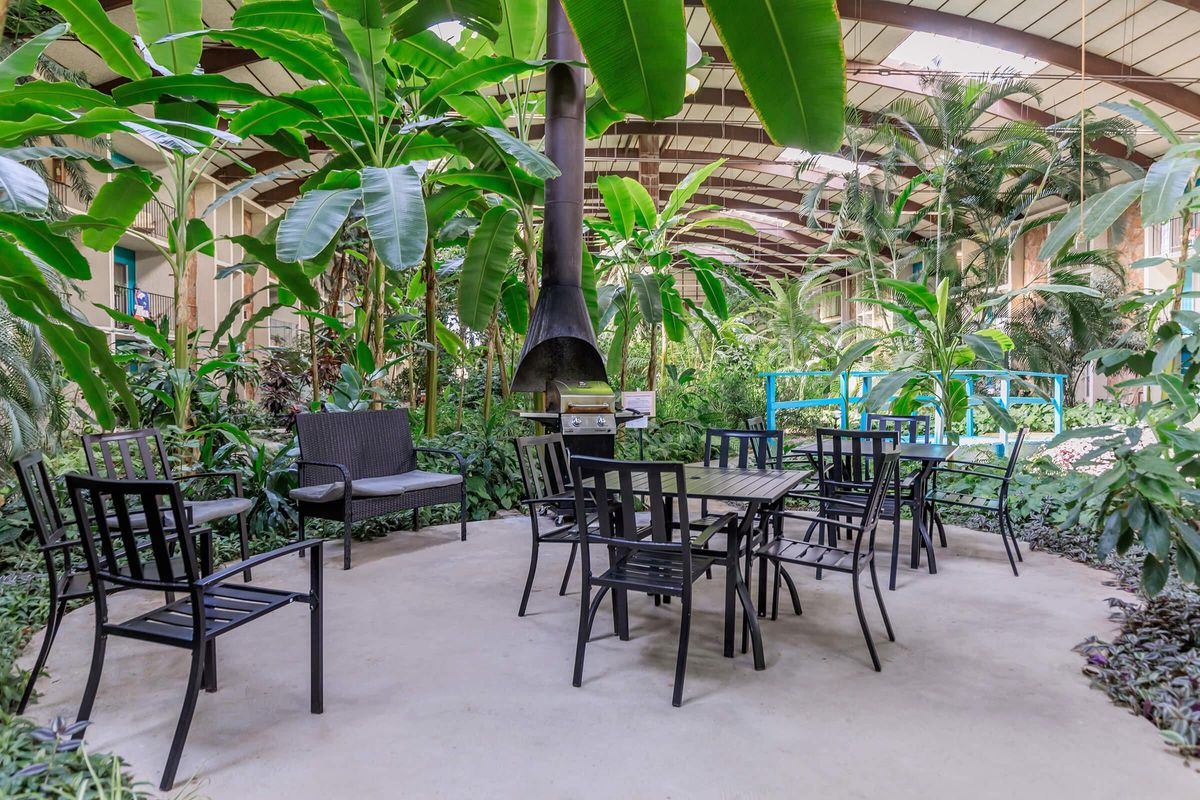 a group of lawn chairs sitting on top of a table