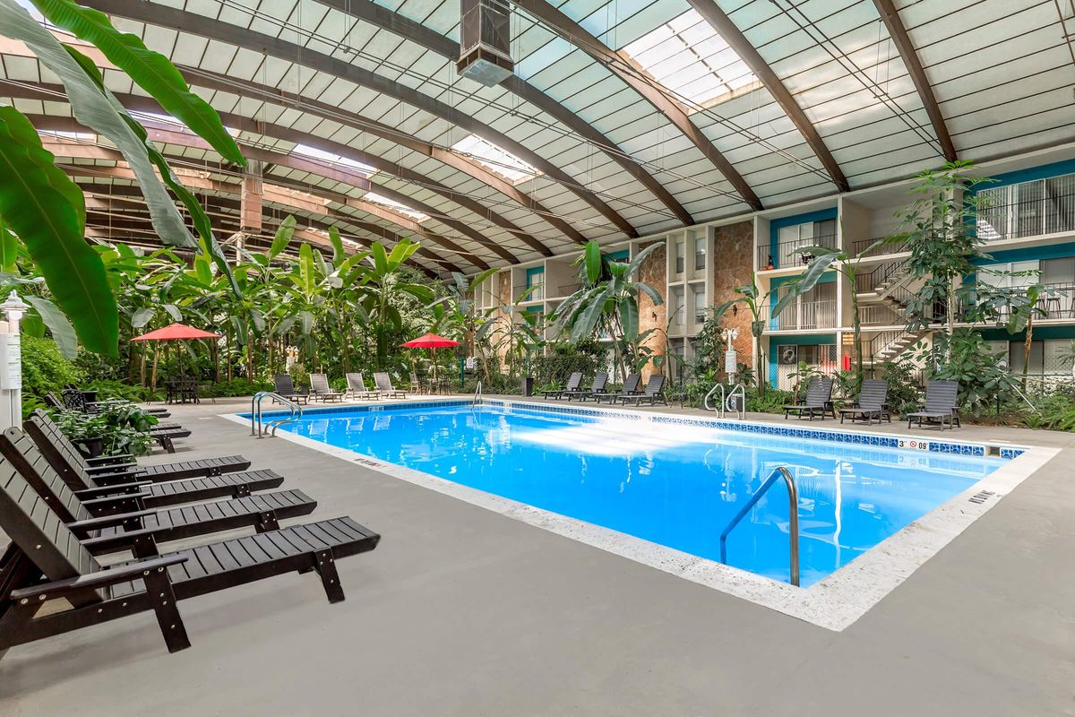 a blue bench in a pool