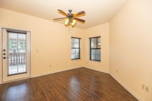 a room filled with furniture and a large window