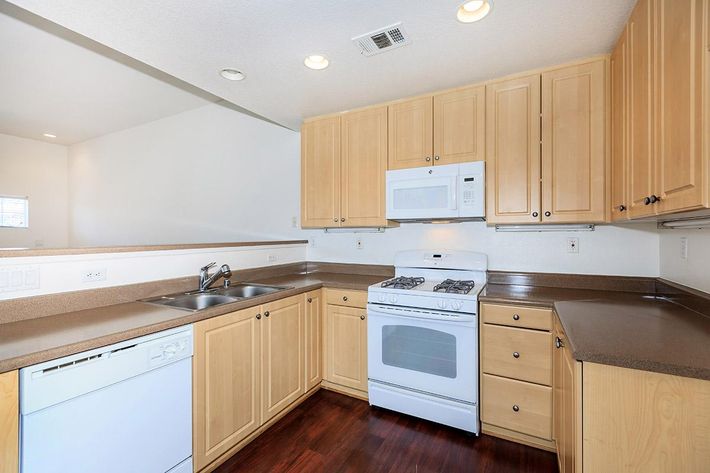 Kitchen with wooden cabinets