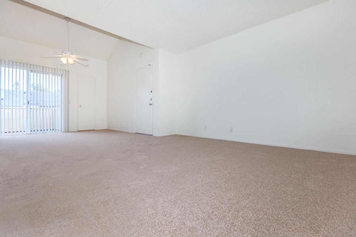 a bedroom with a bed in a room