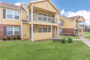 a large lawn in front of a house