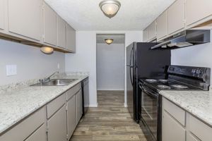 a large kitchen with stainless steel appliances