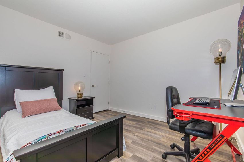 Furnished bedroom shown — representative home at Amara.