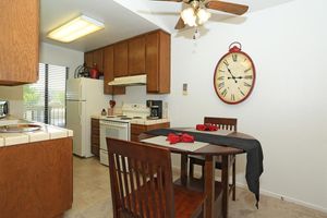 a kitchen with a table in a room