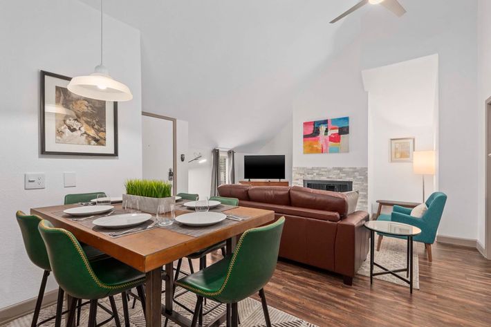 a kitchen with a table in a room