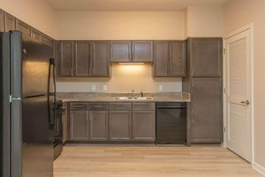 a stainless steel refrigerator in a kitchen