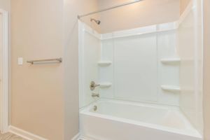 a close up of a shower in a small room