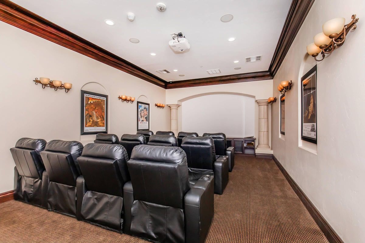 a living room with a leather chair