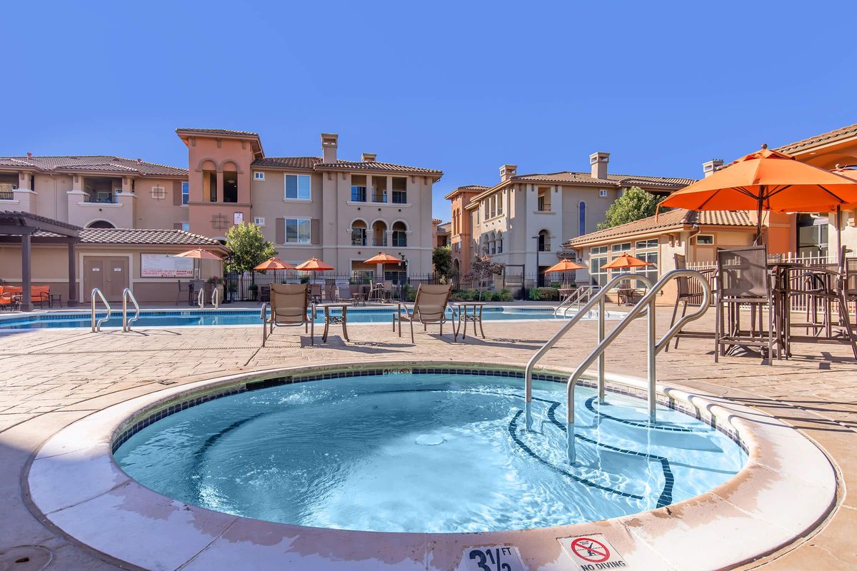 a large pool of water in front of a building