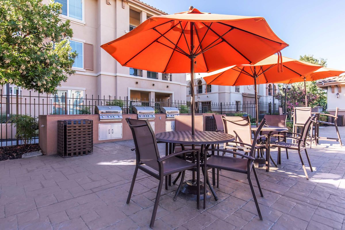 an umbrella sitting on top of a table