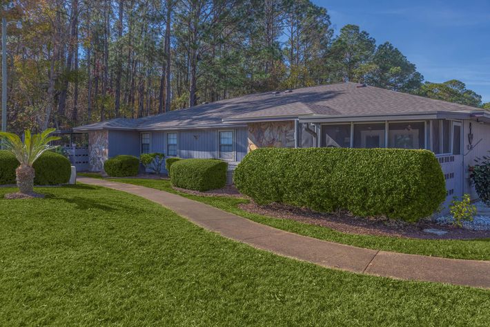 a large lawn in front of a house