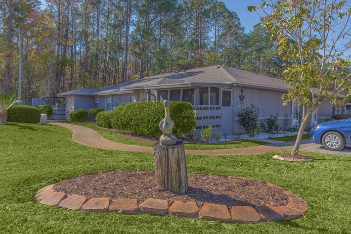 a large lawn in front of a house