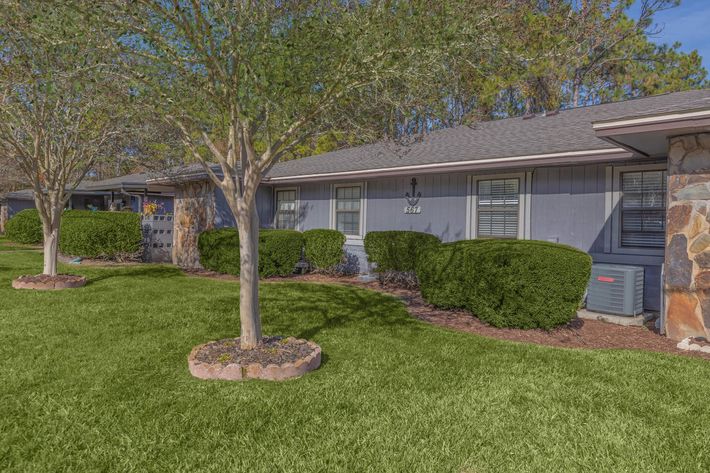 a large lawn in front of a house