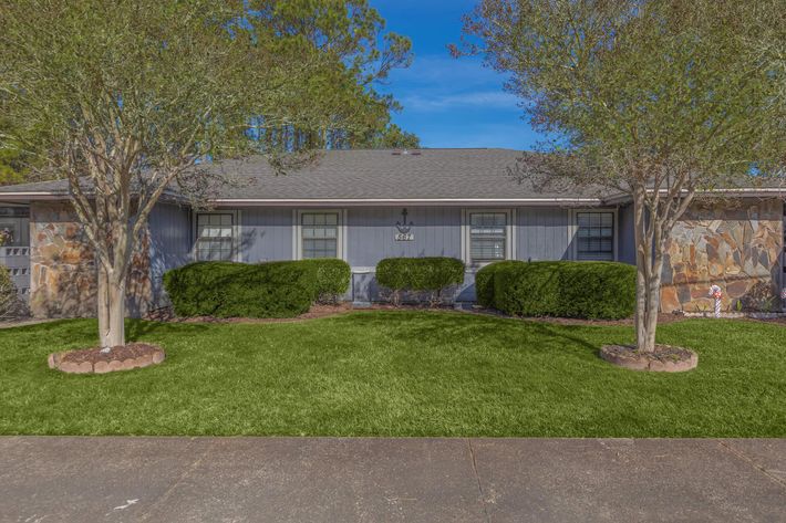 a large lawn in front of a house