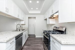 kitchen with white cabinets