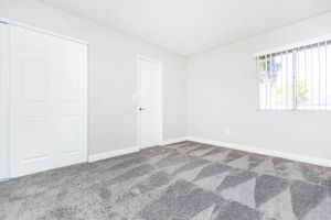 vacant carpeted bedroom