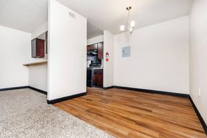 a kitchen with a wood floor