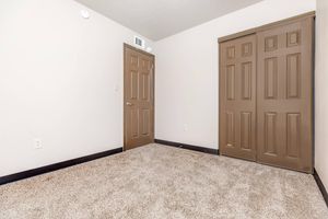 a wooden door in a room