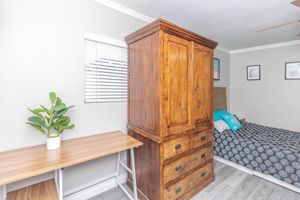 Wooden desk and armoire 