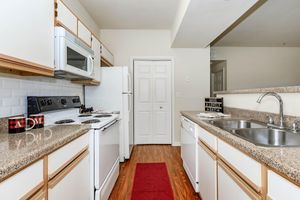 kitchen with white cabinets