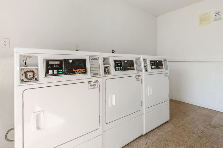 a stove top oven sitting inside of a refrigerator