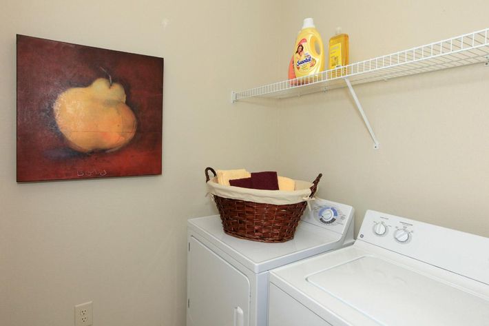 a stove top oven sitting inside of a room