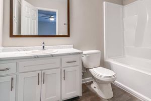 a bathroom with a large mirror