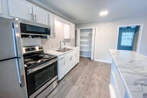 a kitchen with stainless appliances