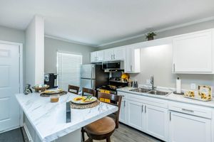 a kitchen with a sink and a counter