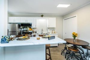 a kitchen with a dining table