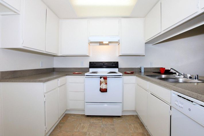 Kitchen with a red kitchen towel