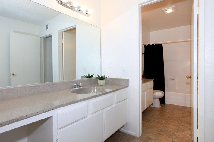 Bathroom with black shower curtain