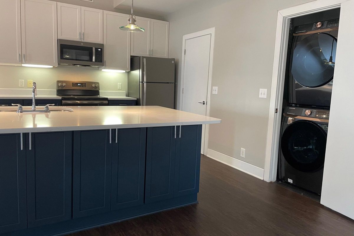 a kitchen with stainless steel appliances