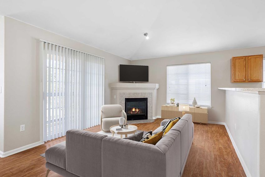 view of fireplace from couch