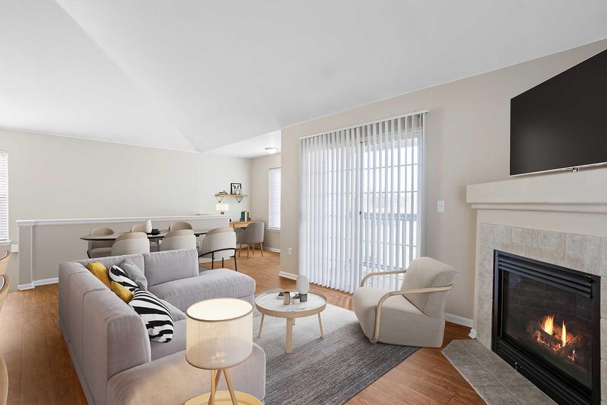 living room with fireplace and sofa