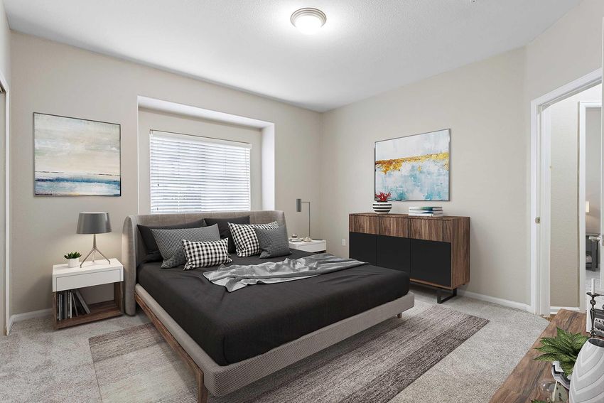 staged bedroom with large window