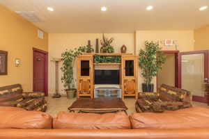 community room with an entertainment center