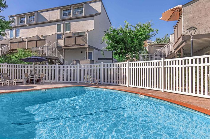 a house with a large pool of water