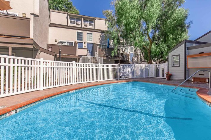 a pool next to a building