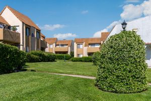 a large lawn in front of a house