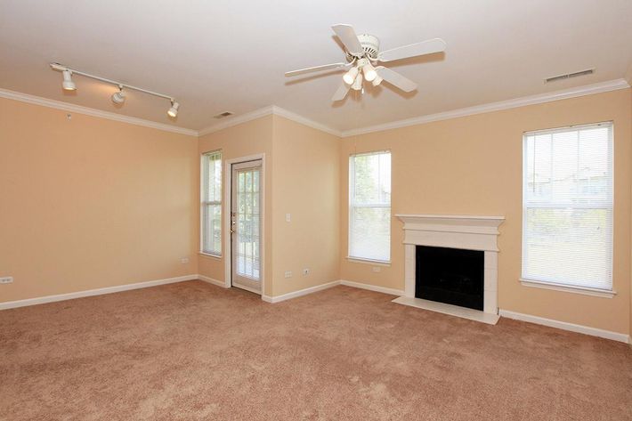 a room filled with furniture and a flat screen tv