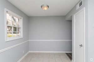 a room with a sink and a window