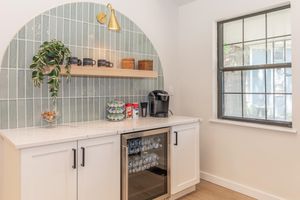 a kitchen with a sink and a window